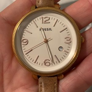 Fossil. Large face, leather band, women’s watch.